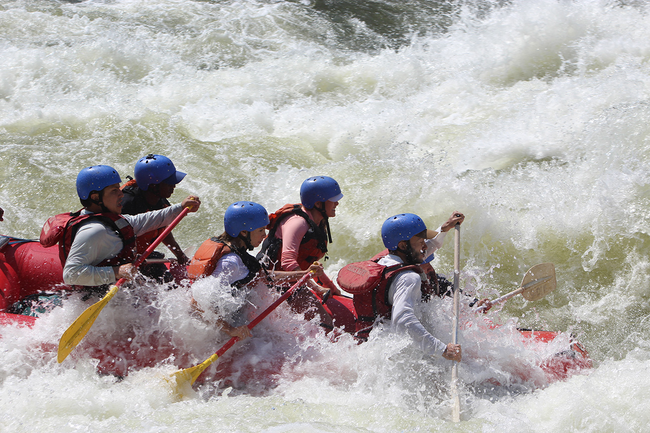 Image of clients rafting with khanondo safaris